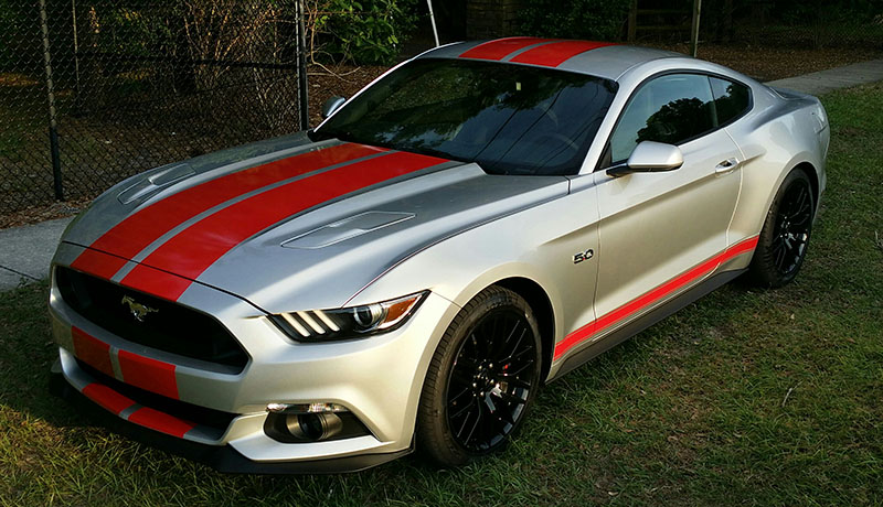 silver car with red stripes